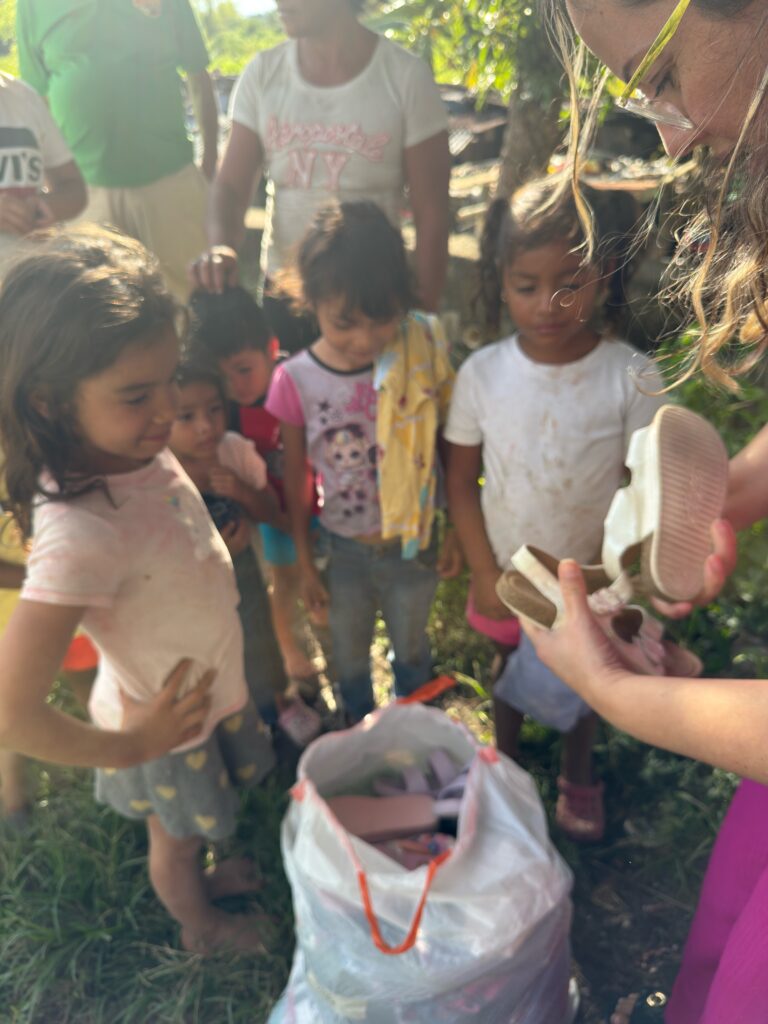 Honduras 2026 outreach. Shoe distribution for the kids in the community.